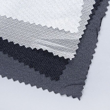 Knitted interlining or fusible interlining